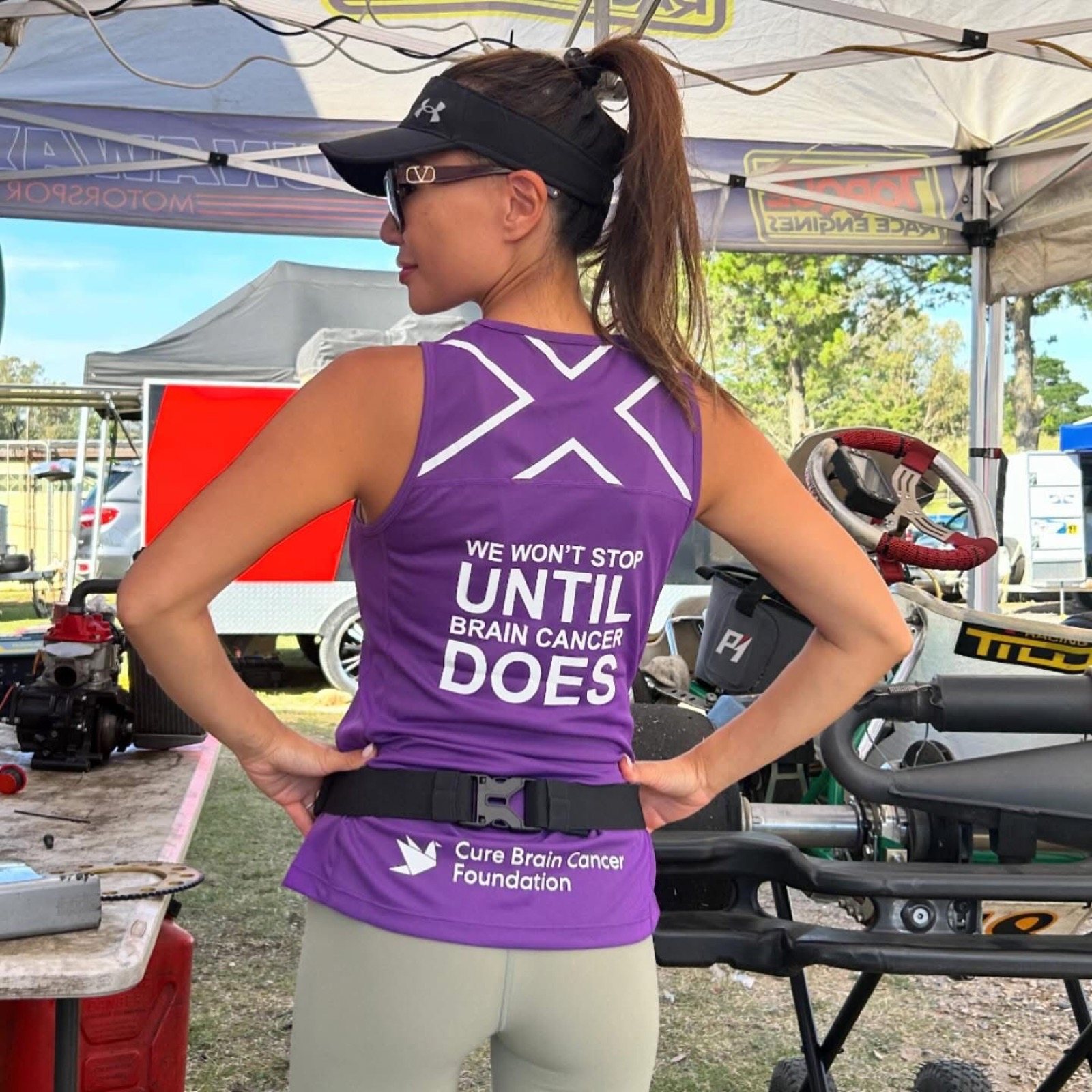 Julie Crawshay wearing a Cure Brain Cancer Foundation singlet that reads We Won't Stop Until Brain Cancer Does